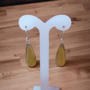 Aretes ovalados de ámbar amarillo y plata